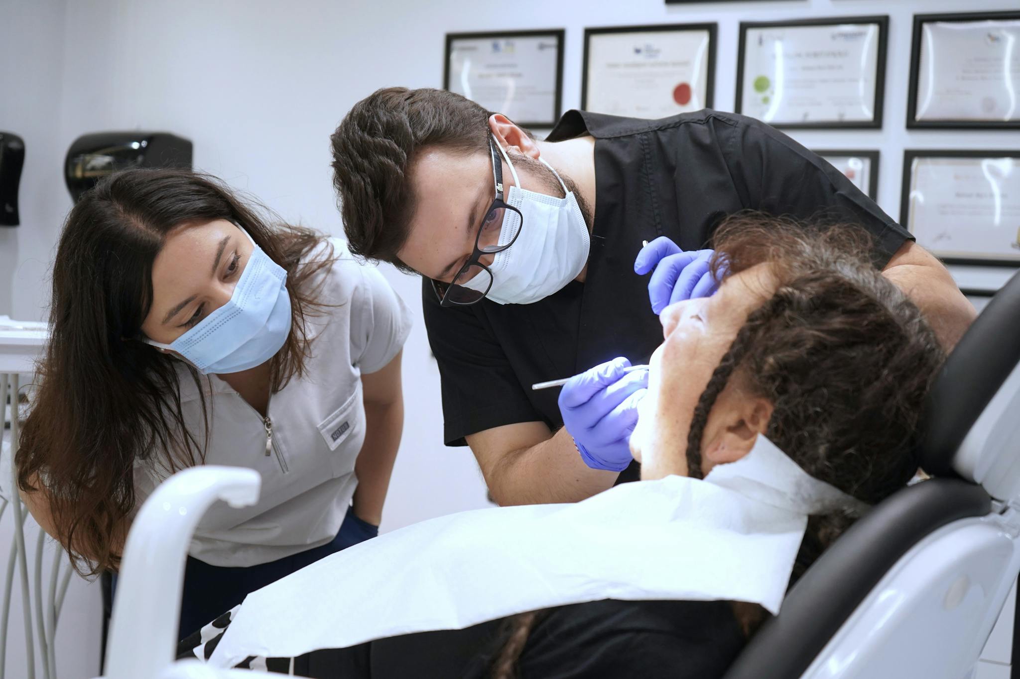 a woman and man in a dental